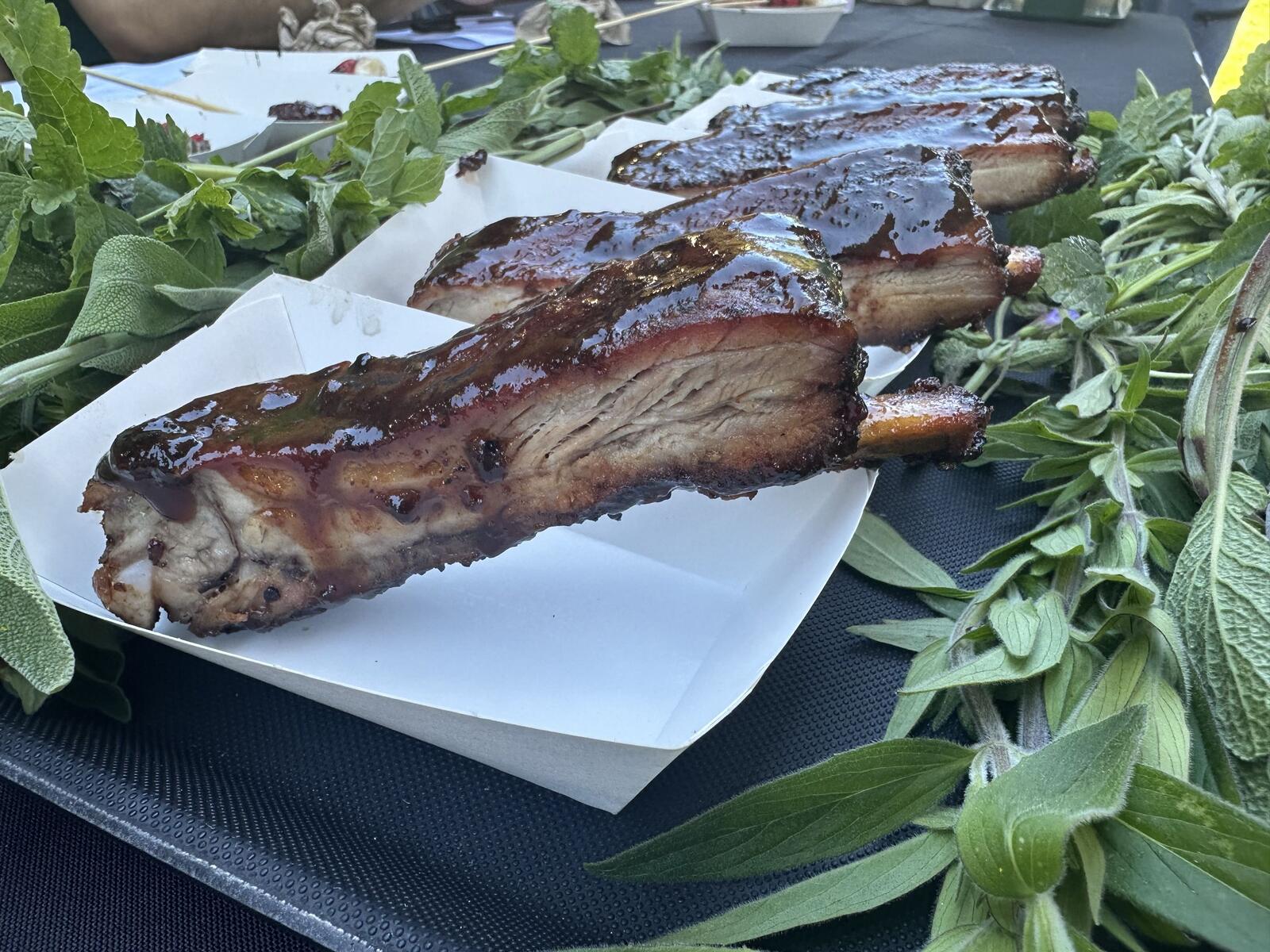 A tray of barbecued ribs cooked by scouts